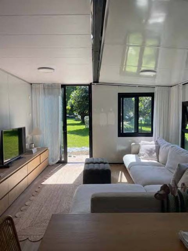 Wanbang expandable container house — wing folded vs expanded